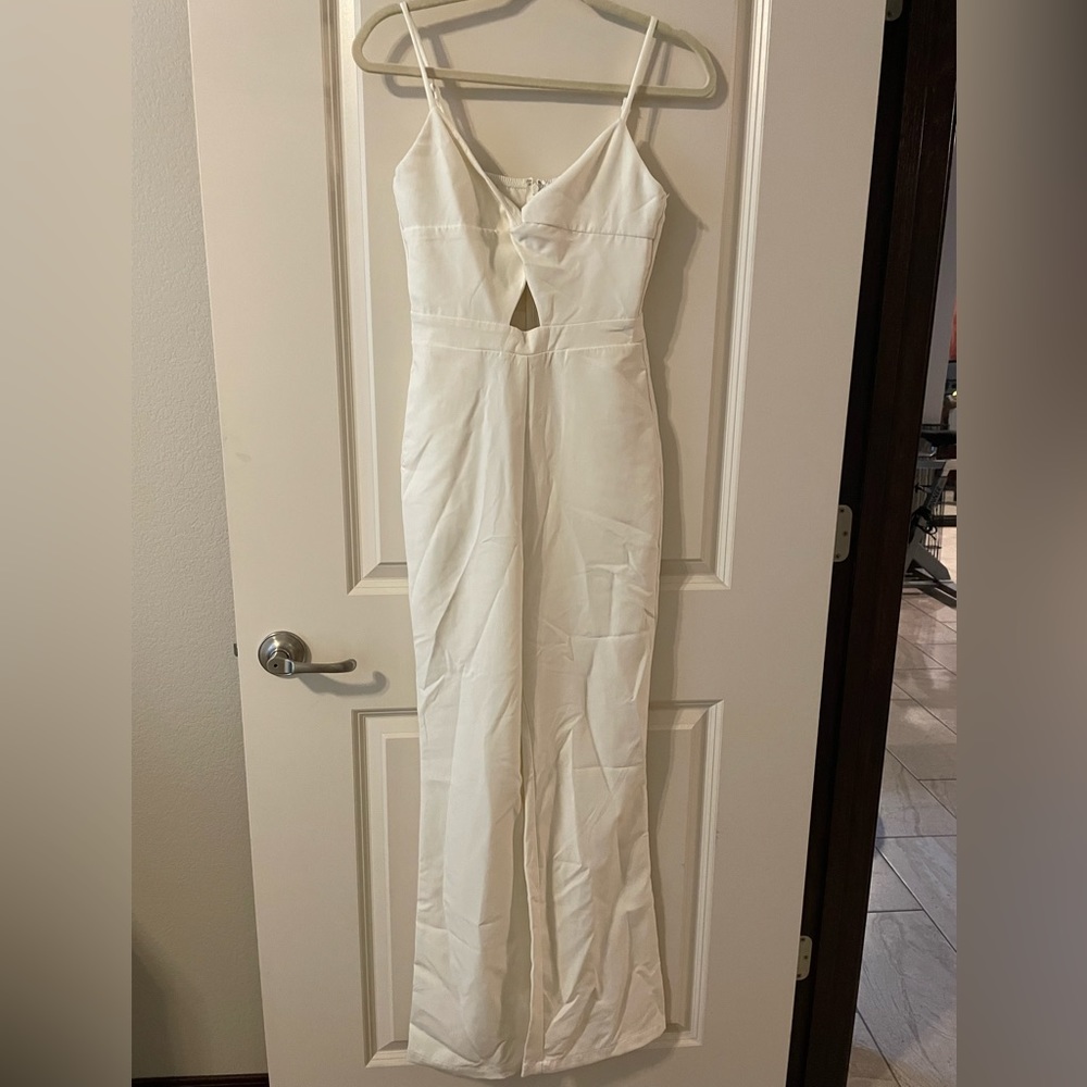 Socialite white jumpsuit romper size xs.  New w/ out tag